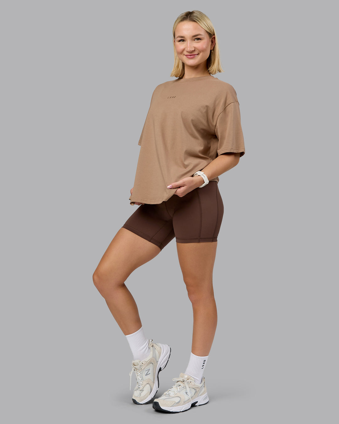 Woman wearing On Repeat FLXCotton Oversized Tee - Light Taupe-Choc | Model:Halle | Size:XS