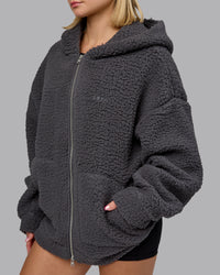 Woman wearing Sherpa Oversized Jacket - Dark Storm | Model:Halle | Size:XS