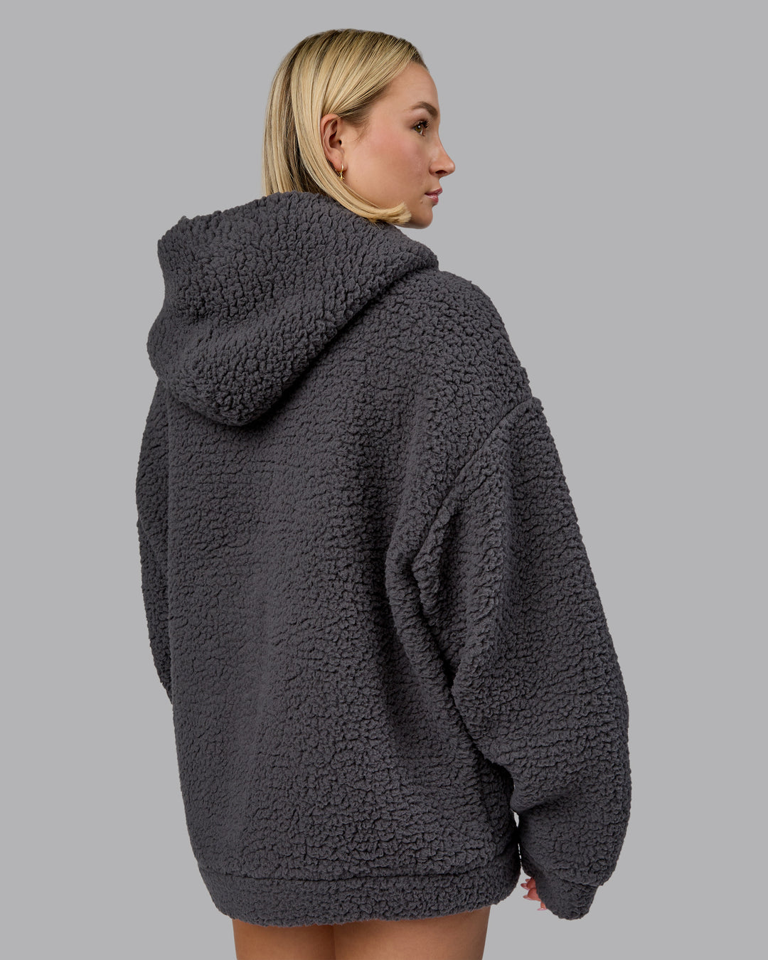 Woman wearing Sherpa Oversized Jacket - Dark Storm | Model:Halle | Size:XS