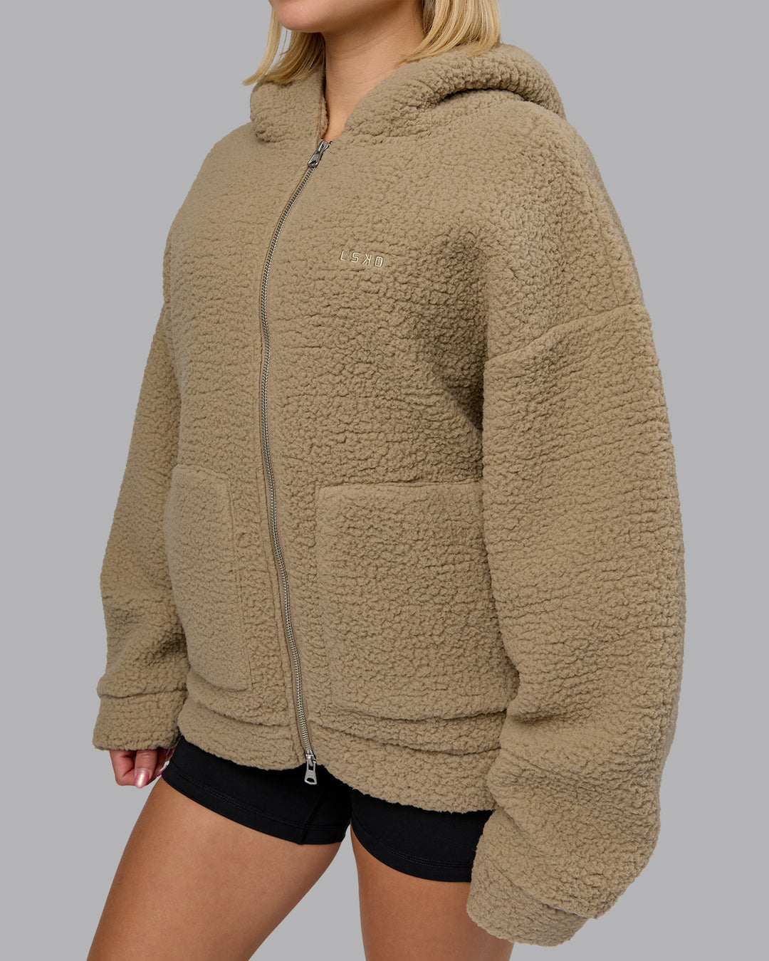 Woman wearing Sherpa Oversized Jacket - Greige | Model:Halle | Size:XS