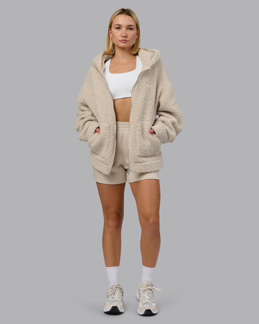 Woman wearing Sherpa Oversized Jacket - Shale Beige | Model:Halle | Size:XS