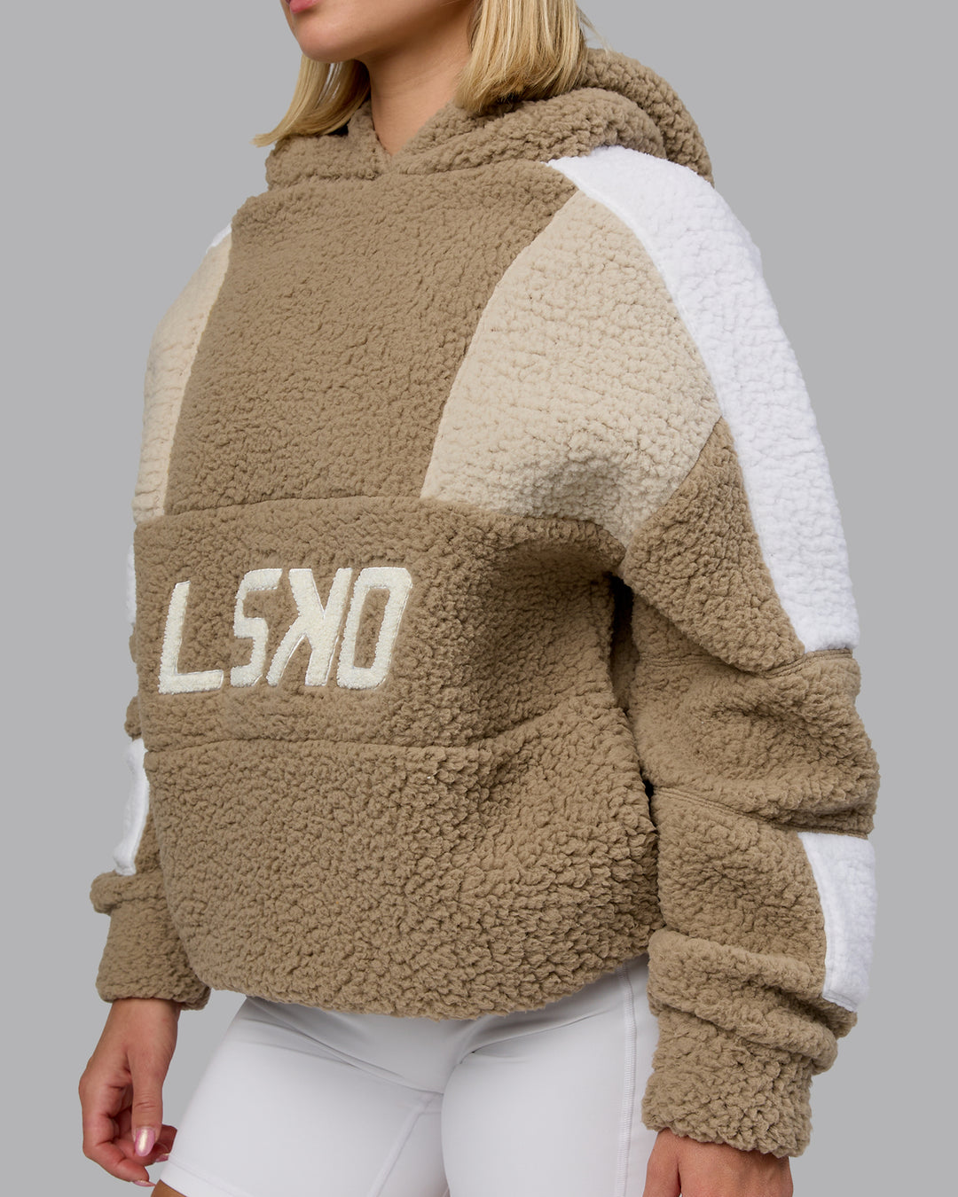 Woman wearing Sherpa Slam Hoodie Oversized - Greige-Shale Beige-White | Model:Halle | Size:XS