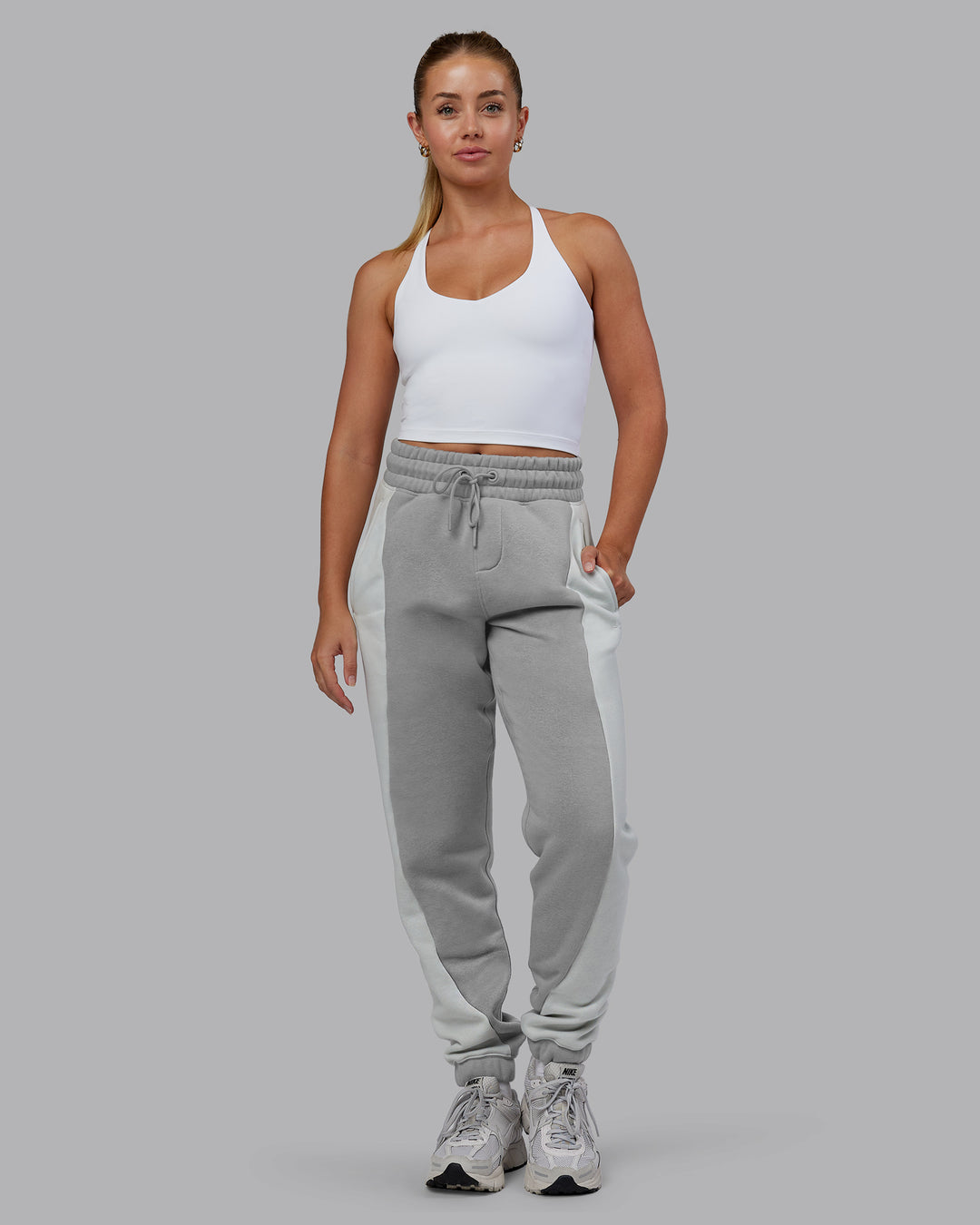 Woman wearing Stream Panel Track Pants - Circular Grey-Digital Mist | Model:Hannah | Size:XS