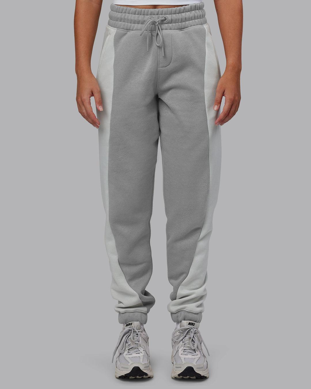 Woman wearing Stream Panel Track Pants - Circular Grey-Digital Mist | Model:Hannah | Size:XS