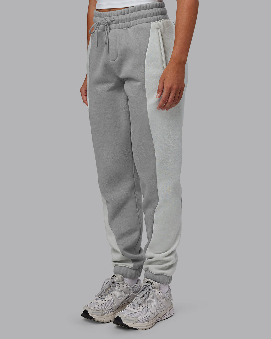 Woman wearing Stream Panel Track Pants - Circular Grey-Digital Mist | Model:Hannah | Size:XS