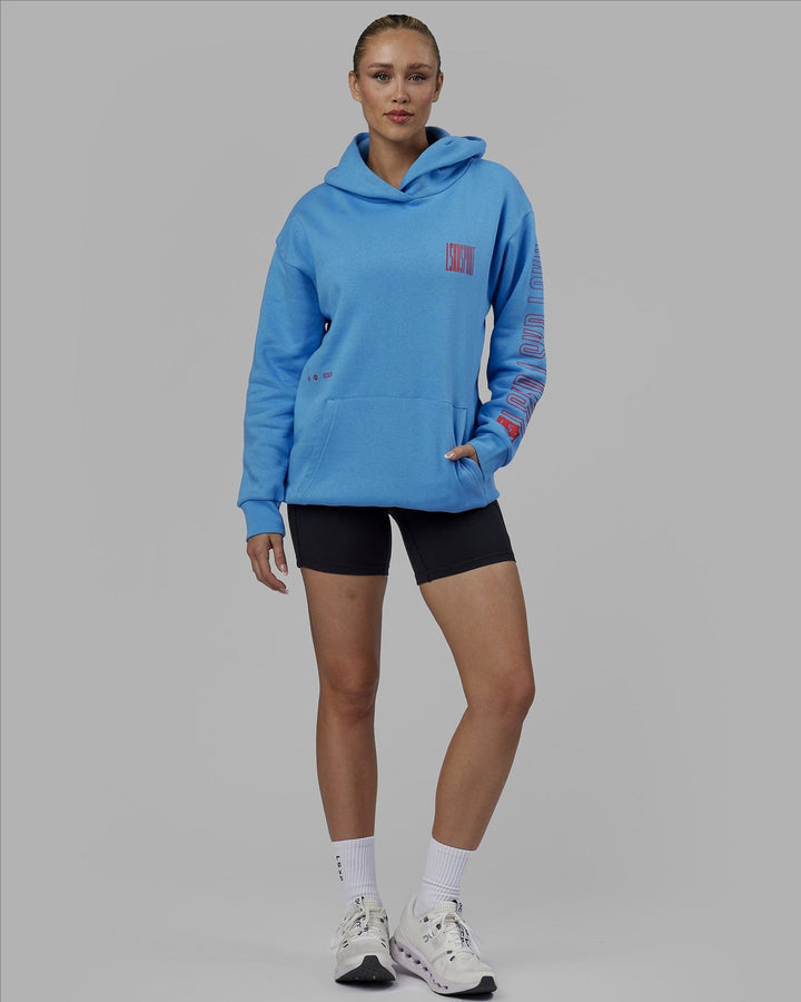 Woman wearing Unisex Stretch It Hoodie Oversize - Azure Blue