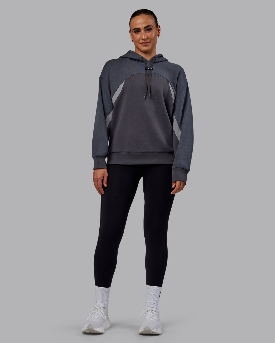 Woman wearing Unisex Y2K Concept Panel Hoodie - Asphalt-Turbulance - view 10