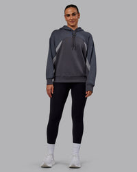 Woman wearing Unisex Y2K Concept Panel Hoodie - Asphalt-Turbulance | Thumbnail Index: 9