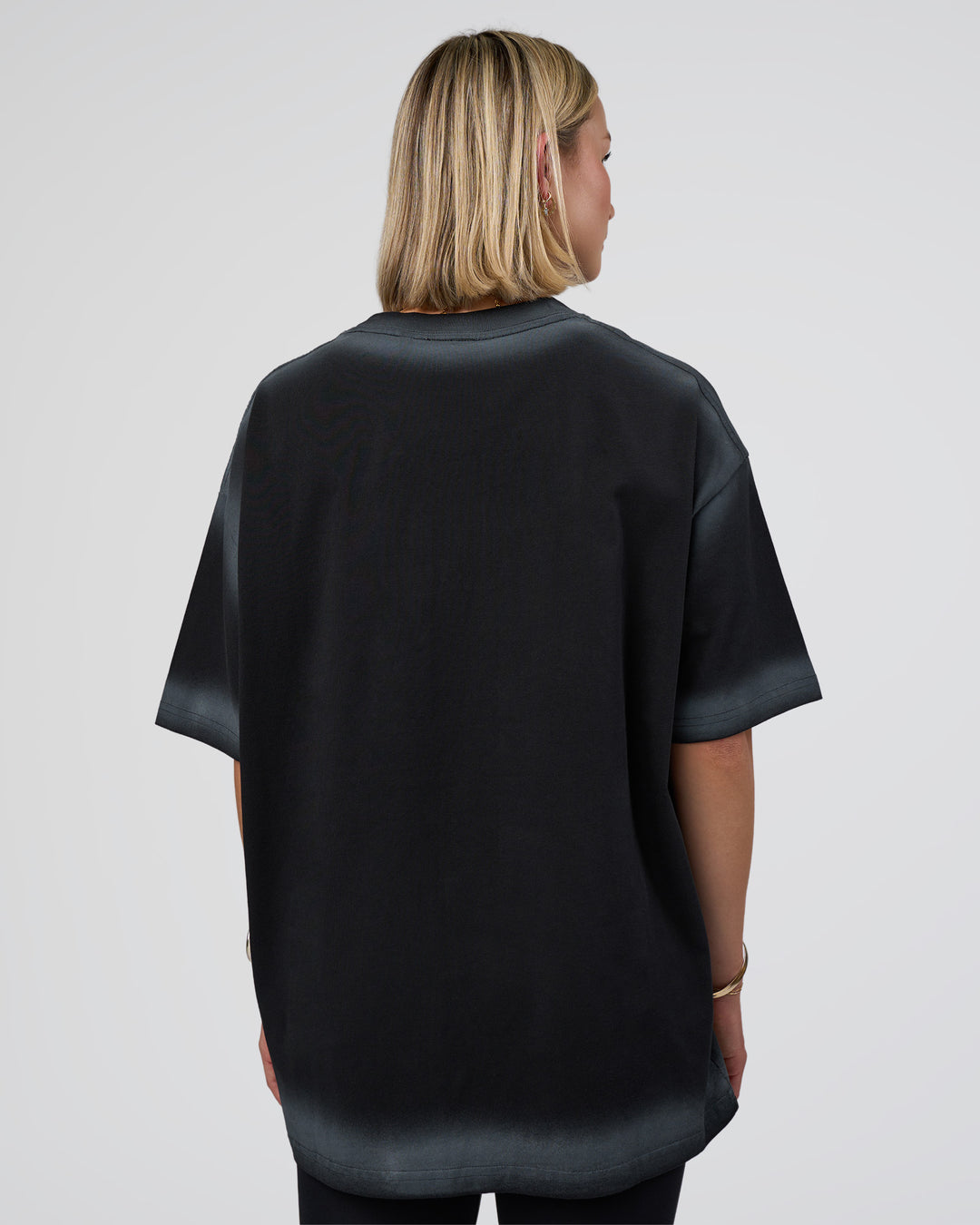 Woman wearing Urban Blur Heavyweight Unisex Oversized Tee - Black-Dark Storm | Model:Halle | Size:XS