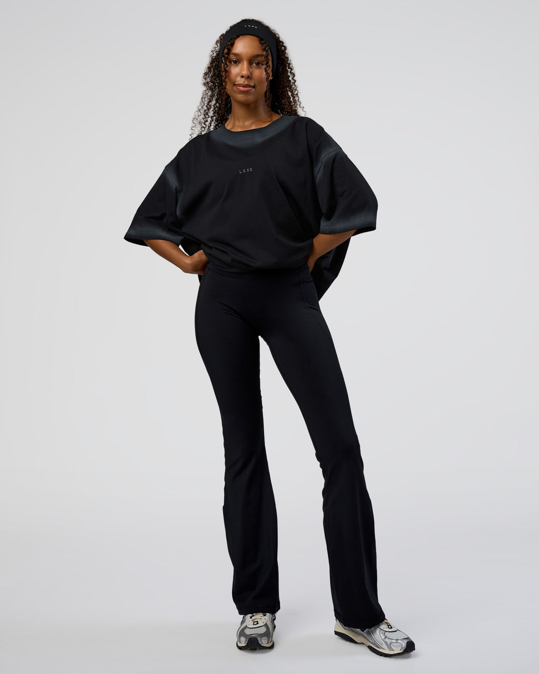 Woman wearing Urban Blur Heavyweight Unisex Oversized Tee - Black-Dark Storm | Model:Jordan | Size:S