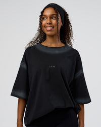 Woman wearing Urban Blur Heavyweight Unisex Oversized Tee - Black-Dark Storm | Model:Jordan | Size:S