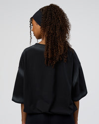 Woman wearing Urban Blur Heavyweight Unisex Oversized Tee - Black-Dark Storm | Model:Jordan | Size:S