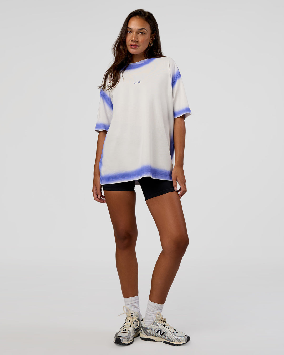 Woman wearing Urban Blur Heavyweight Unisex Oversized Tee - Off White-Power Cobalt | Model:Kirstyn | Size:XS