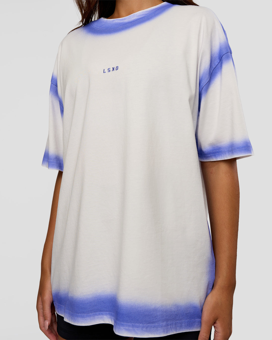 Woman wearing Urban Blur Heavyweight Unisex Oversized Tee - Off White-Power Cobalt | Model:Kirstyn | Size:XS