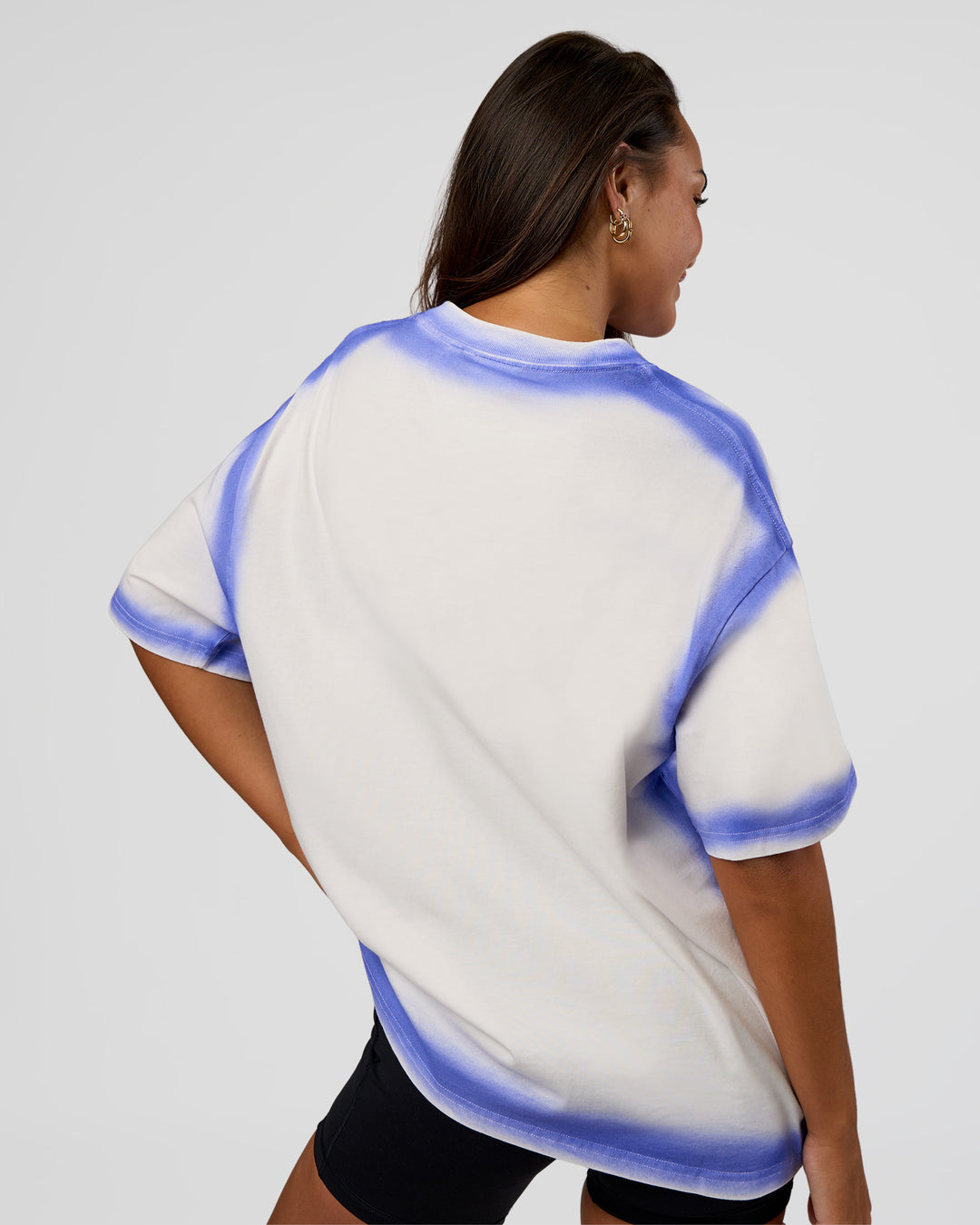 Woman wearing Urban Blur Heavyweight Unisex Oversized Tee - Off White-Power Cobalt | Model:Kirstyn | Size:XS