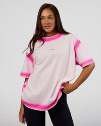 Woman wearing Urban Blur Heavyweight Unisex Oversized Tee - Off White-Ultra Pink | Model:Kirstyn | Size:XS