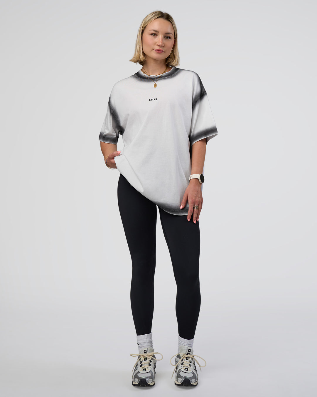 Woman wearing Urban Blur Heavyweight Unisex Oversized Tee - White-Black | Model:Halle | Size:XS