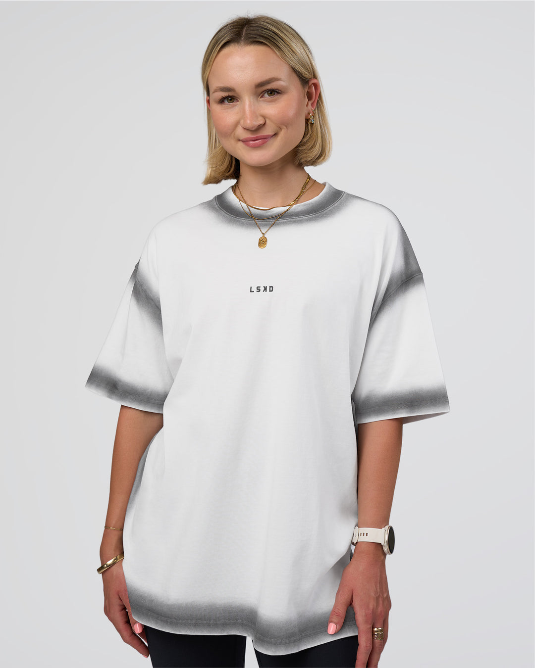 Woman wearing Urban Blur Heavyweight Unisex Oversized Tee - White-Black | Model:Halle | Size:XS