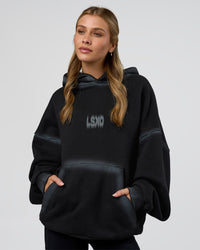 Woman wearing Urban Blur Unisex Oversized Hoodie - Black-Dark Storm | Model:Leilani | Size:XS