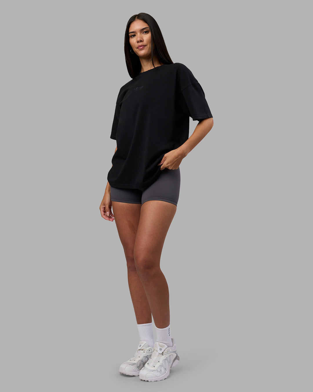 Woman wearing Variation Heavyweight FLXCotton Oversized Tee - Black-Black | Model:Rhiley | Size:XS