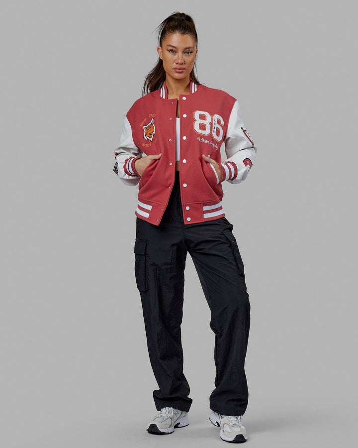 Woman wearing Unisex Varsity Bomber Jacket - Mineral Red
