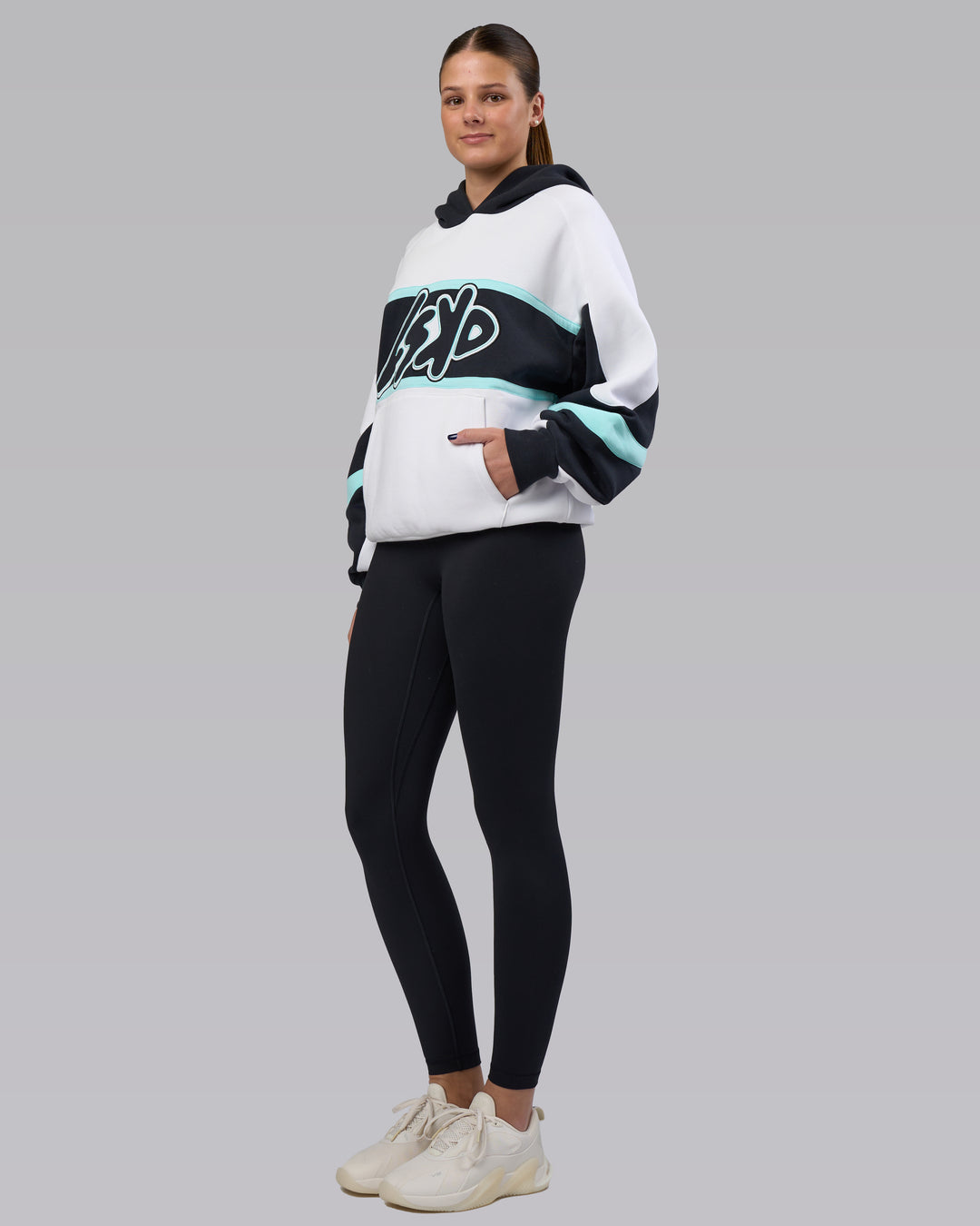 Woman wearing Vibe Oversized Unisex Hoodie - White-Island Paradise | Model:Phoebe | Size:XS