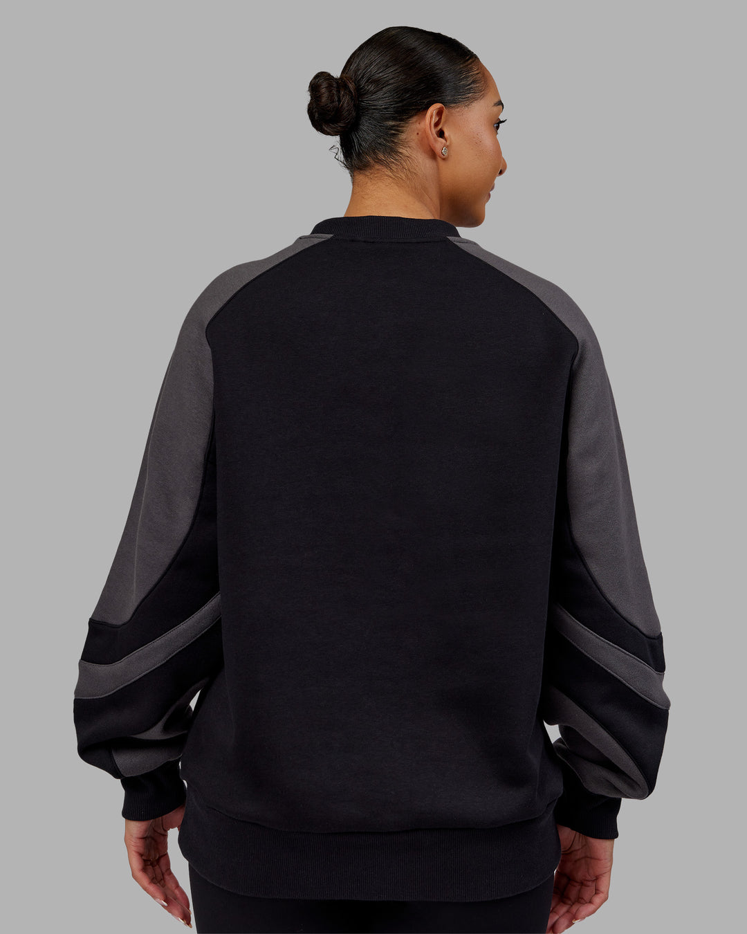 Woman wearing Vibe Oversized Unisex Sweater - Black-Dark Storm | Model:Ayla  Size:XS