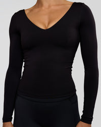 Woman wearing Vitality Long Sleeve Top - Black | Model:Maja | Size:XS | Thumbnail Index: 6
