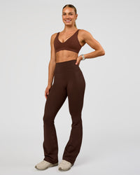 Woman wearing Vitality Sports Bra - Hot Chocolate | Model:Maja | Size:XS