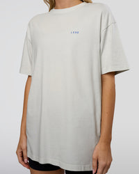 Woman wearing We Love This  FLXCotton Oversized Tee - Digital Mist Washed-Electric Indigo | Model:Leilani | Size:XS