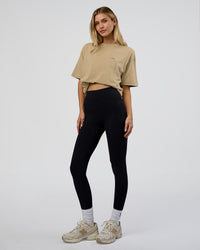 Woman wearing We Love This  FLXCotton Oversized Tee - Greige Washed-Black | Model:Leilani | Size:XS