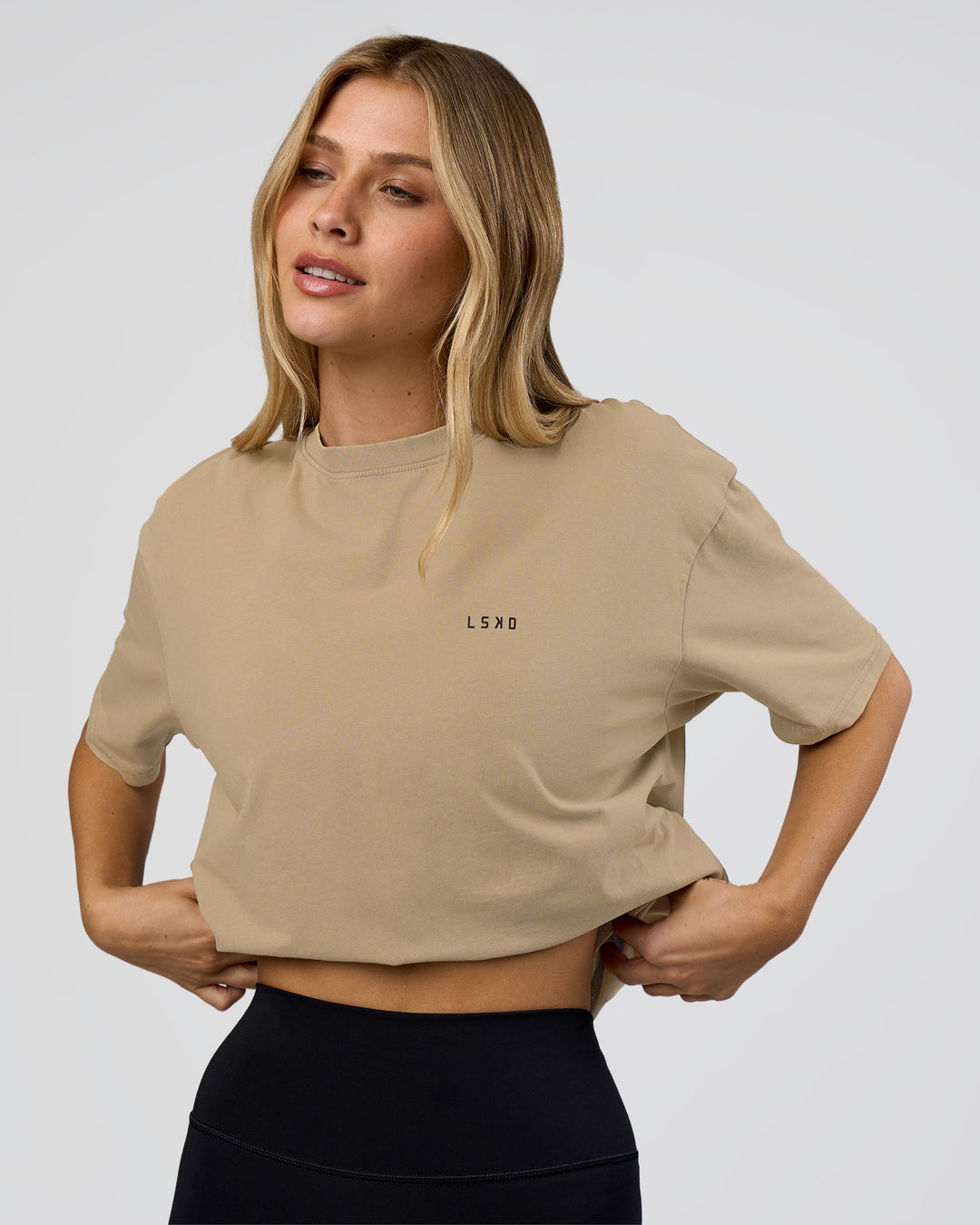 Woman wearing We Love This  FLXCotton Oversized Tee - Greige Washed-Black | Model:Leilani | Size:XS