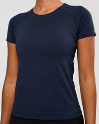 Woman wearing AeroFLX+ Seamless Tee - Future Navy/Future Navy | Model:Charli | Size:XS