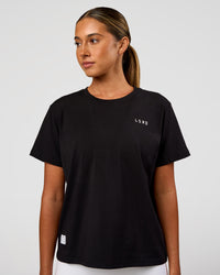 Woman wearing VS6 FLXCotton Regular Fit Tee - Black-White | Model:Charli | Size:XS