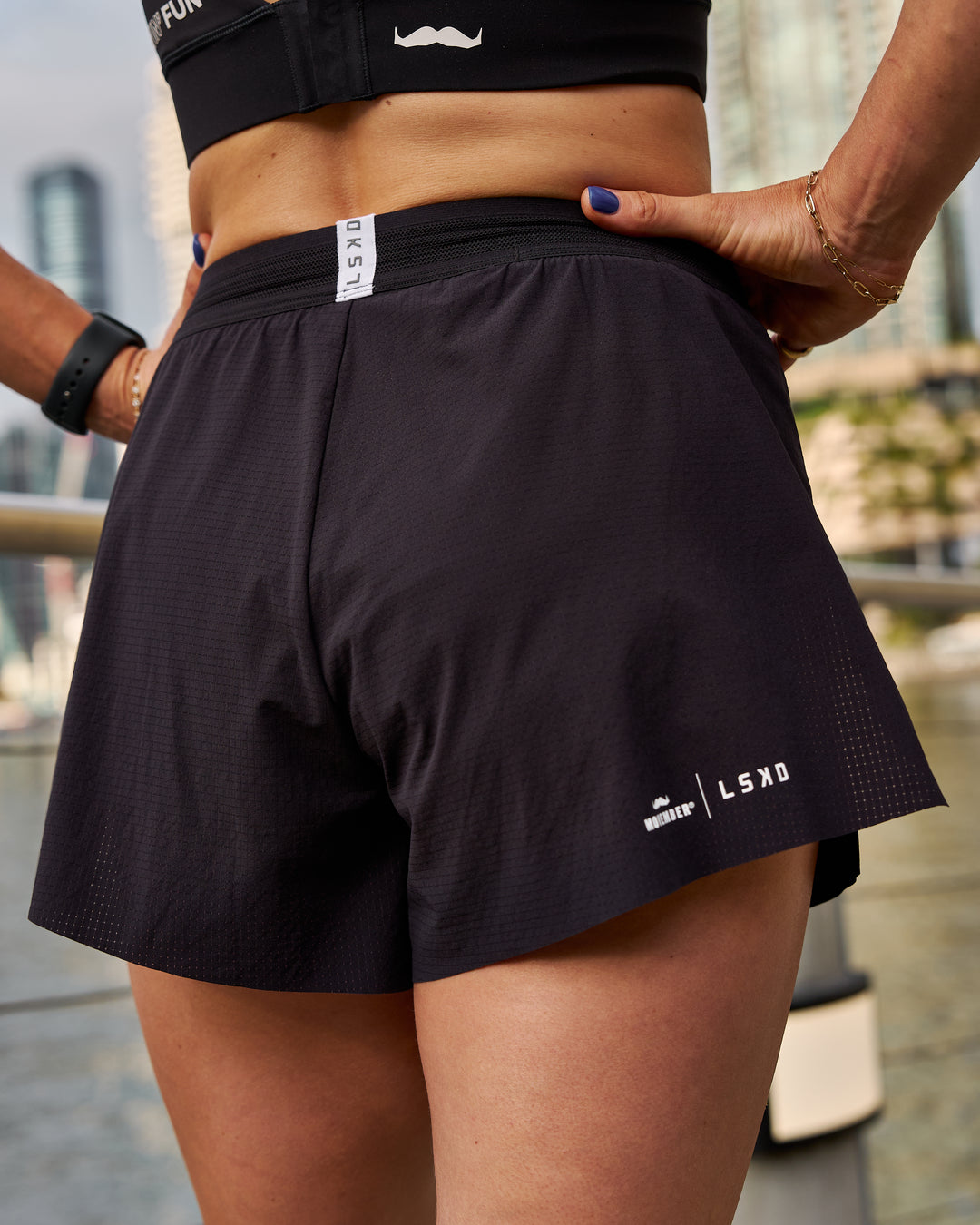 Campaign image of Movember x LSKD Accelerate 3" High-Rise Running Short - Black - view 4