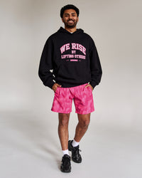 Campaign image of Rep 7" Performance Short - Radiant Pink | Thumbnail Index: 1