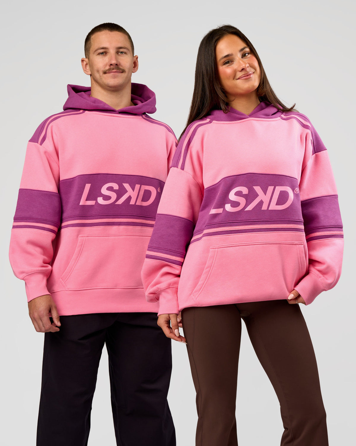 Duo wearing A-Team Oversized Hoodie - Candy Pink-Boysenberry | Model:Jaiden | Size:L | Model:Bianca | Size:S - view 1