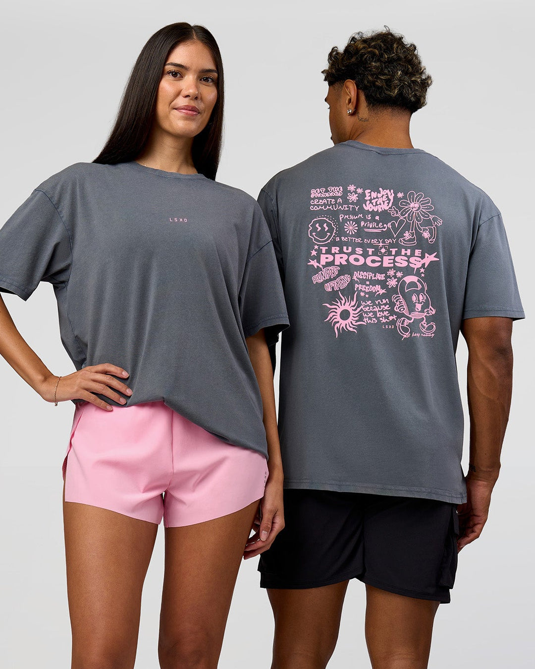 Duo wearing Built On Values FLXCotton Oversized Tee - Dark Storm Washed-Pink Rose | Model:Xav | Size:L | Model:Rhiley | Size:XS - view 1