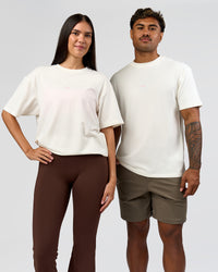 Duo wearing Built On Values FLXCotton Oversized Tee - Off White-Pink Rose | Model:Xav | Size:L | Model:Rhiley | Size:XS | Thumbnail Index: 10