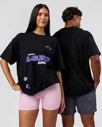 Duo wearing League Heavyweight FLXCotton Oversized Tee - Black-Power Cobalt | Model:Xav | Size:L | Model:Rhiley | Size:XS
