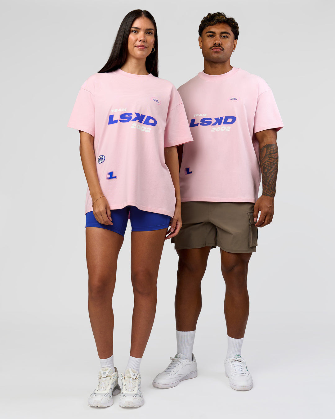 Duo wearing League Heavyweight FLXCotton Oversized Tee - Marshmallow-Power Cobalt | Model:Xav | Size:L | Model:Rhiley | Size:XS