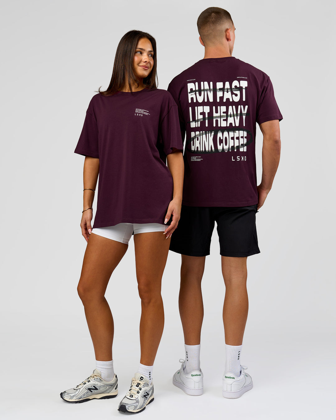 Duo wearing Coffee Run FLXCotton Oversized Tee - Cherry Lacquer-Black | Model:Albert | Size:M | Model:Bianca | Size:XS - view 4