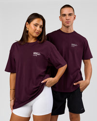 Duo wearing Coffee Run FLXCotton Oversized Tee - Cherry Lacquer-Black | Model:Albert | Size:M | Model:Bianca | Size:XS | Thumbnail Index: 12