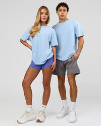 Duo wearing Benchmark FLXCotton Oversized Tee - Open Air-Blue Bell | Model:Leandro | Size:M | Model:Issy | Size:XS
