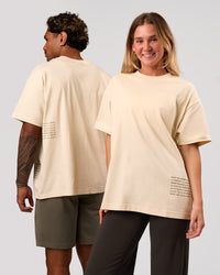 Duo wearing Block Heavyweight Oversized Tee  - Vanilla Bean | Model:Amity | Size:S | Model:Xav | Size:L | Thumbnail Index: 3