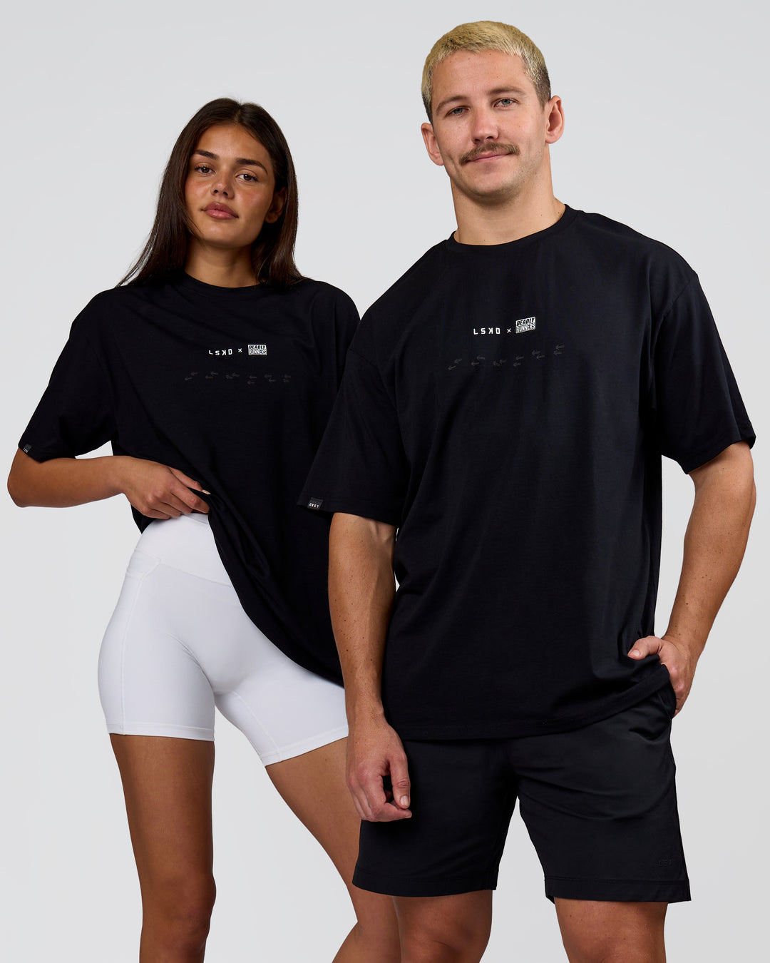 Duo wearing Deadly Runners Run Club FLXCotton Oversize Tee - Black | Model:Bella | Size:S | Model:Jaiden | Size:M - view 8