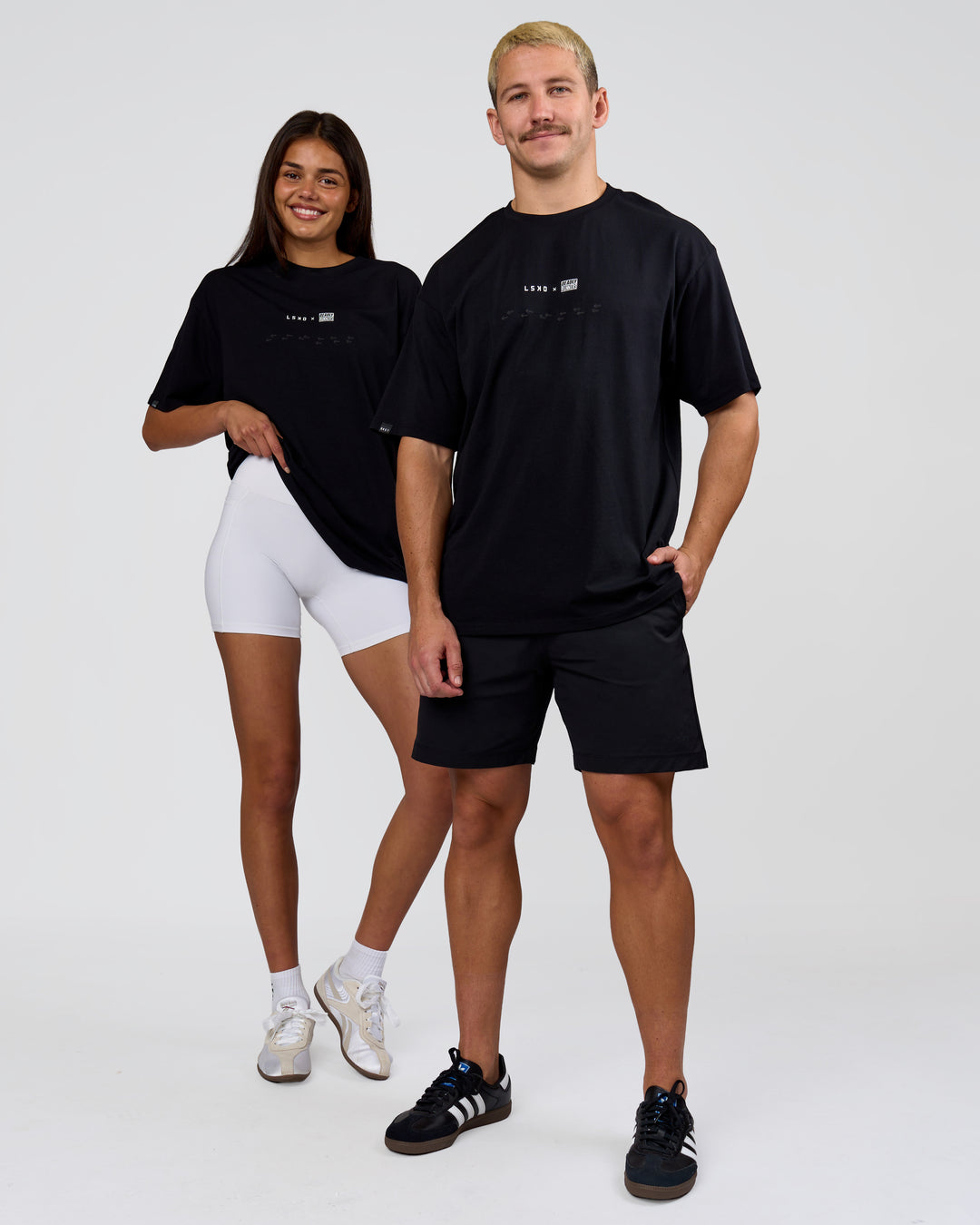 Duo wearing Deadly Runners Run Club FLXCotton Oversize Tee - Black | Model:Bella | Size:S | Model:Jaiden | Size:M - view 14