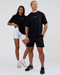 Duo wearing Deadly Runners Run Club FLXCotton Oversize Tee - Black | Model:Bella | Size:S | Model:Jaiden | Size:M | Thumbnail Index: 16
