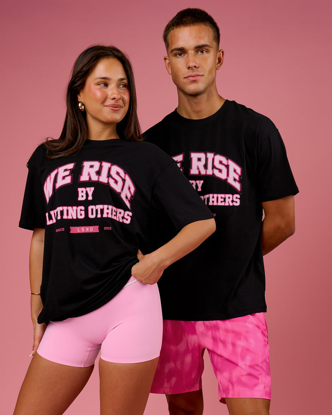 Duo wearing BCAM FLXCotton Graphic Oversized Tee - Black | Model:Bianca | Size:S | Model:Albert | Size:M - view 1