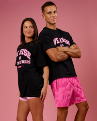 Duo wearing BCAM FLXCotton Graphic Oversized Tee - Black | Model:Bianca | Size:S | Model:Albert | Size:M | Thumbnail Index: 22